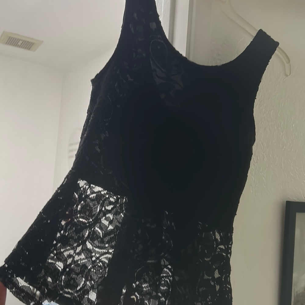 Black lace peplum top with bow back